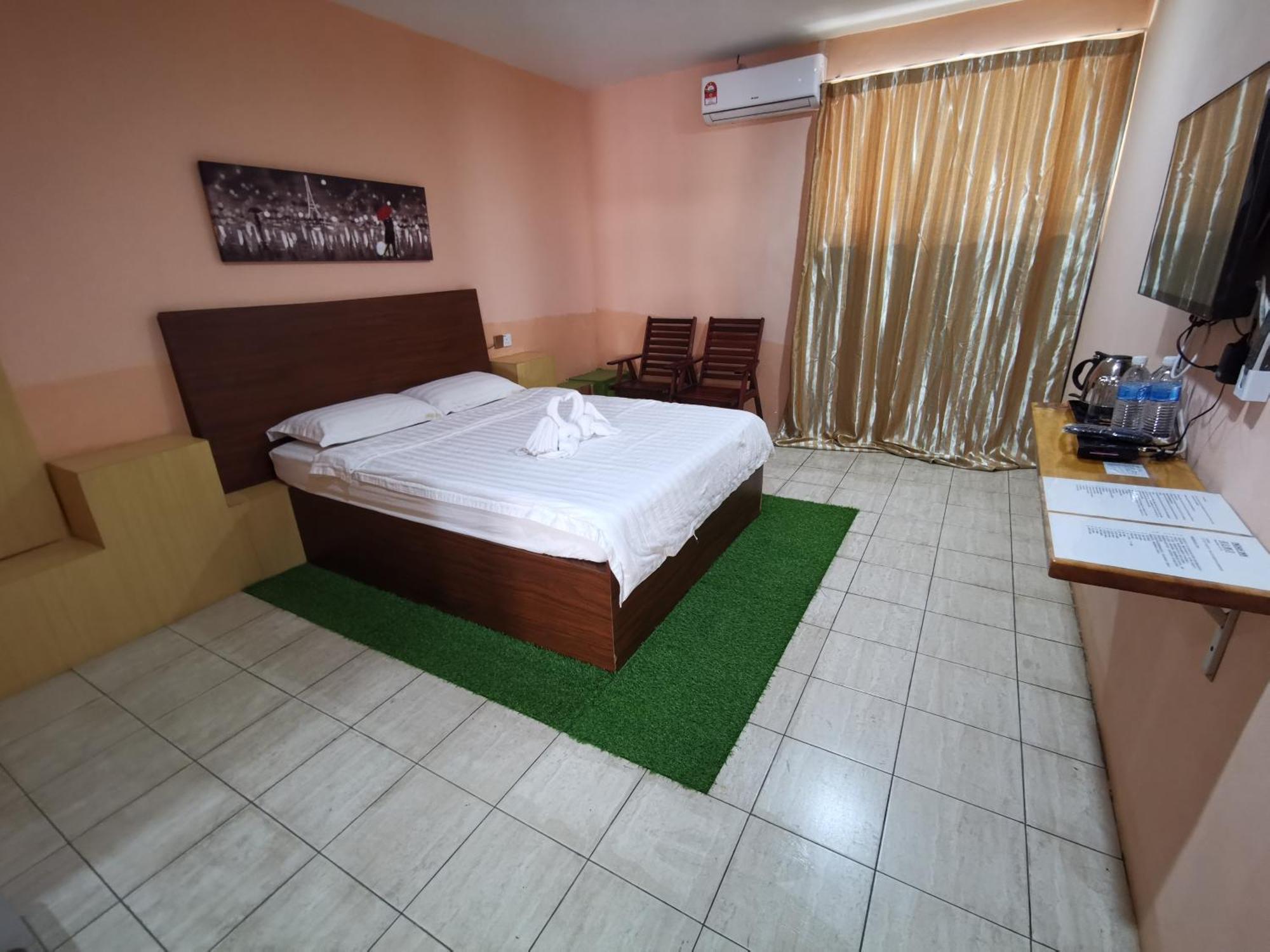 Indah Inn Tawau Værelse billede